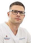 Врач Коновалов Андрей Александрович